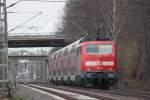 RE10427 mit Schublok 111 155 nach Dortmund an Km 25.8 der KBS485 25.3.10