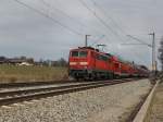 Die 111 031 mit dem RE nach Salzburg am 20.03.2010 unterwegs bim B Vogel.