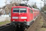 Die 111 113-7 zieht ihren RE4 Von Dortmund nach Aachen durch Erkrath am 02.04.2010