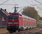 111 154 mit dem RE10410 nach Aachen am Km 29.0 kurz vor Geilenkirchen, 18.4.10