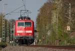 111 009-7 mit dem RE10424 und 10 Minuten Versptung auf dem Weg nach Aachen am Km 25.8 zwischen Geilenkirchen und bach-Palenberg 18.4.10