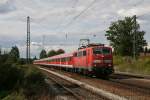 111 043 mit RE am 29.08.2010 in Ostermnchen.