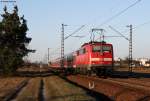 RE 38858 (Karlsruhe Hbf-Mannheim Hbf) mit Schublok 111 069-1 bei Wiesental 2.3.11