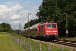 111 148-3 mit einem RegionalExpress in Grokarolinfeld am 13.08.2011