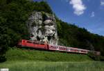 DB 111 021-2 schiebt RB 30573 Ingolstadt - Regensburg, KBS 993 Regensburg - Ulm, fotografiert zwischen Sinzing und Matting am 04.06.2010 