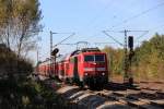 111 006 mit einem Regionalzug nach Salzburg aufgenommen kurz vor Vaterstetten bei Mnchen am 16.10.11