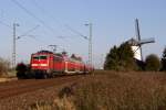 111 112 mit dem RE 4 nach Aachen Hbf in Bttgen am 24.10.2011