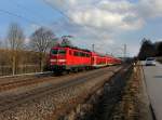 Die 111 205 mit einem RE nach Mnchen am 25.02.2012 unterwegs bei Vilshofen.