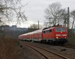 111 013-9 mit dem RE 9 Rhein-Sieg-Express (Aachen-Kln-Siegen) fhrt am 31.03.2012 Richtung Siegen, hier bei Betzdorf-Bruche.