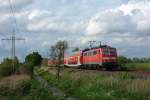 111 145-9 fuhr am 11 05.2012 mit einem RE nach Mnster, hier sdlich von Leer.