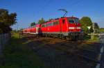 111 120-2 schiebt am Sonntag den 16.9.2012 eine RE7-Einheit nach Krefeld.