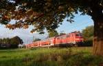 111 134-3 fuhr am 28.09.2012 mit einem RE von Emden nach Mnster, hier in Leer.