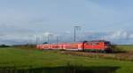 111 141-8 fuhr am 30.10.2012 mit einem RE von Emden nach Mnster, hier bei Petkum.