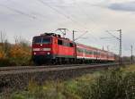 Die 111 206 mit einer RB nach Schlchtern am 30.10.2010 unterwegs bei Thngersheim.