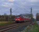 Abendstimmung mit RE 4 und 111 160-8 bei Korschenbroich.