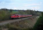 111 222 mit einem RE nach Nrnberg Hbf am 13.04.2012 bei Laaber.