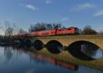 111 175 mit einem RE nach Salzburg am 02.03.2013 auf der Saalachbrcke bei Freilassing.