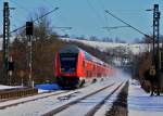 Eine wegen schlechter Sicht unerkannte 111er schiebt am 13.03.2013 den RE1 auf der KBS 480 durch den Haltepunkt Eilendorf nach Aachen.