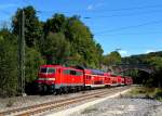 111 221 mit einem RE nach Augsburg am 06.09.2011 bei Mhren.