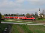 Die 111 204 mit einem RE nach Salzburg am 21.04.2013 unterwegs bei Stephanskirchen.