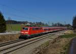 111 036 mit einem RE nach Salzburg am 05.03.2013 am B Vogl.