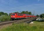 111 123 mit einem RE nach Passau am 15.06.2013 auf der Isarbrcke bei Plattling.