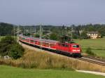 Die 111 175 mit einem RE nach Salzburg am 24.08.2013 unterwegs bei Teisendorf.