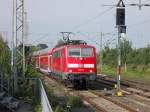 111 116 mit RE4 Richtung Aachen Hbf in Rheydt an Gleis 4.