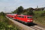 111 023 mit RE 79015 am 22.09.2013 in Stra bei Teisendorf.
