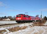 Die 111 021 mit einer RB nach Mittenwald am 08.12.2013 unterwegs bei Ohlstadt.