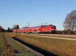 Die 111 180 mit einem RE nach Salzburg am 14.12.2013 unterwegs bei Übersee.