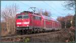 Ein Hauch von Frühling mitten im Dezember 2013 an der KBS 485 bei Rimburg.Die 111 157-4 mit dem Wupper Express (RE 4) am Haken, ist unterwegs nach Aachen.