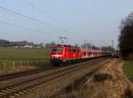 Die 111 021 mit einem M nach Salzburg am 08.03.2014 unterwegs bei Vogl.