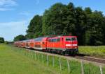 111 053 mit einem RE nach Salzburg am 14.08.2011 bei Vogl.