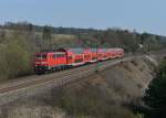 111 185 mit einem RE nach Nürnberg am 21.03.2014 bei Laaber.