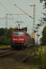 111 119 mit einer RE4 nach Düsseldorf Hbf bei Herrath.