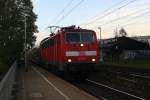 111 151-7 DB kommt die Kohlscheider-Rampe hoch aus Richtung Neuss,Herzogenrath mit einem RE4 aus Dortmund-Hbf-Aachen-Hbf und fährt durch Kohlscheid in Richtung Richterich,Laurensberg,Aachen-West. Bei Sonne und Wolken am Morgen vom 24.10.2014.