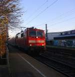 111 150-9 DB kommt die Kohlscheider-Rampe hoch aus Richtung Neuss,Herzogenrath mit dem RE4 aus Dortmund-Hbf-Aachen-Hbf und fährt durch Kohlscheid in Richtung Richterich,Laurensberg,Aachen-West bei schönem Novemberwetter am Morgen vom 25.11.2014.