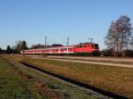 Die 111 130 mit einem RE nach Salzburg am 14.12.2013 unterwegs bei Übersee.