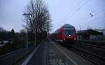 Ein RE4 von Dortmund-Hbf nach Aachen-Hbf und am Zugende ist die 111 122 DB kommt die Kohlscheider-Rampe hoch und fährt durch Kohlscheid in Richtung Richterich,Laurensberg,Aachen-West.
Bei Regenwolken am Kalten Morgen vom 10.2.2015.