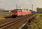 111 008 auf dem Weg nach Krefeld mit einem RE7 bei  Kaarst Broicherseite fahrend am Sonntag den 22.2.2015