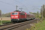 Wupper Express, RE 4 nach Aachen im Gleisbogen bei Rimburg, Übach-Palenberg gezogen von 111 155. Auf der KBS 485 bei Km 21,8 am 24.04.2015 