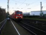 111 169 DB  kommt die Kohlscheider-Rampe hoch aus Richtung Neuss,Herzogenrath mit dem RE4 aus Dortmund-Hbf nach Aachen-Hbf und hält in Kohlscheid und fährt dann weiter in Richtung Richterich,Laurensberg,Aachen-West,Aachen-Schanz,Aachen-Hbf. Aufgenommen vom Bahnsteig 2 in Kohlscheid. 
Am einem Kalten Morgen vom 8.1.2016.