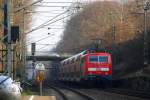 Ein Nachschuss von der 111 119 DB schiebt den RE4 aus Aachen-Hbf nach Dortmund-Hbf kommt aus Richtung Aachen-West,Laurensberg,Richterich, und fährt durch Kohlscheid in Richtung