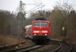 111 118-6 DB kommt mit dem RE4 aus Dortmund-Hbf nach Aachen-Hbf und kommt aus Richtung Rheydt,Wickrath,Beckrath,Herrath,Erkelenz,Baal,Hückelhoven-Baal,Brachelen,,Lindern,Süggerrath,Geilenkirchen,Frelenberg,Zweibrüggen und hat gerade eben in Übach-Palenberg gehalten und fährt weiter in Richtung Finkenrath,Hofstadt,Herzogenrath,Kohlscheid,Richterich,Laurensberg,Aachen-West,Aachen-Schanz,Aachen-Hbf. 
Aufgenommen am Bahnübergang in Rimburg im Wurmtal. 
Bei Wolken am Kalten 19.3.2016.