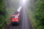 111 191 DB kommt die Kohlscheider-Rampe hoch aus Richtung Neuss,Herzogenrath mit dem RE4 Verstärkerzug von Düsseldorf-Hbf nach Aachen-Hbf und hält gleich in Kohlscheid und fährt in Richterich,Laurensberg,Aachen-West,Aachen-Schanz,Aachen-Hbf. Aufgenommen von der Brücke der Roermonderstraße in Kohlscheid. 
Bei Regenwetter am Nachmittag vom 30.5.2016.