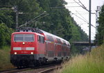 111 125-1 DB kommt die Kohlscheider-Rampe hoch aus Richtung Neuss,Herzogenrath mit einem RE4 Verstärkerzug aus Düsseldorf-Hbf nach Aachen-Hbf und fährt durch Kohlscheid in Richtung