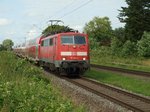 111 143-4 mit einem RE4 nach Aachen Hbf in Herrath. 5.7.2016