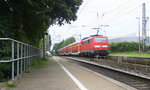 Ein Nachschuss von der 111 121 DB schiebt den RE4 aus Aachen-Hbf nach Dortmund-Hbf kommt aus Richtung Aachen-West,Laurensberg,Richterich, und fährt durch Kohlscheid in Richtung
