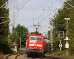 Ein Nachschuss von der 111 119 DB schiebt den RE4 aus Aachen-Hbf nach Dortmund-Hbf und kommt aus Richtung